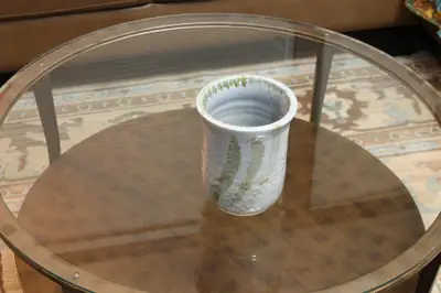 Fern cup. Pale cup with brushed green fern marks.