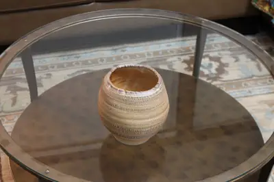 Textured series: round vessel. Round textured vessel with a torn rim.