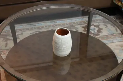 Textured series: white vessel. White textured vessel with a red interior.