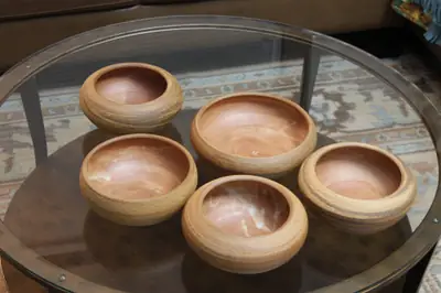 Set of five bowls. Five matching bowls with warm flashed interiors.