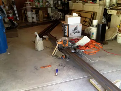Welding. Welding gear and frame members on the shop floor.