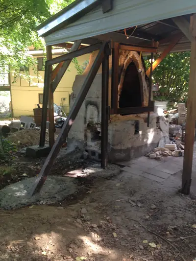 Frame at the kiln. The frame bolted up beside the kiln.