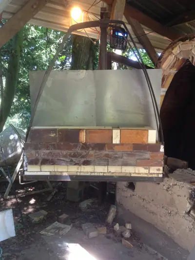 Building the door. Laying the first courses of brick in the door tray.