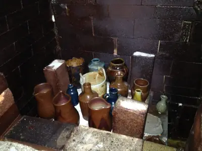 After the firing. Bottles and jars waiting to be unloaded.